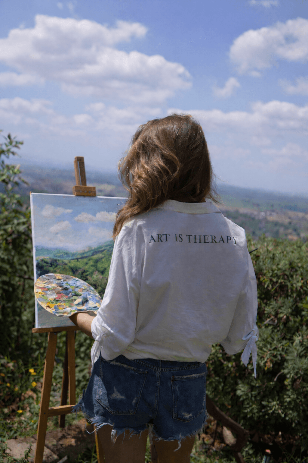 Wine tasting experience at local Tuscan vineyard with glasses of red wine and scenic views